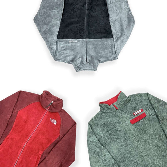 Lot de polaires vintage The North Face et Columbia, sélection de vêtements outdoor de marque en gros pour friperies et revendeurs professionnels.